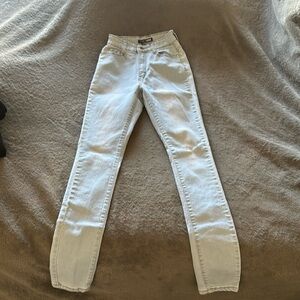 Fashion Nova skinny jeans size 3, light washed blue with brown stitching